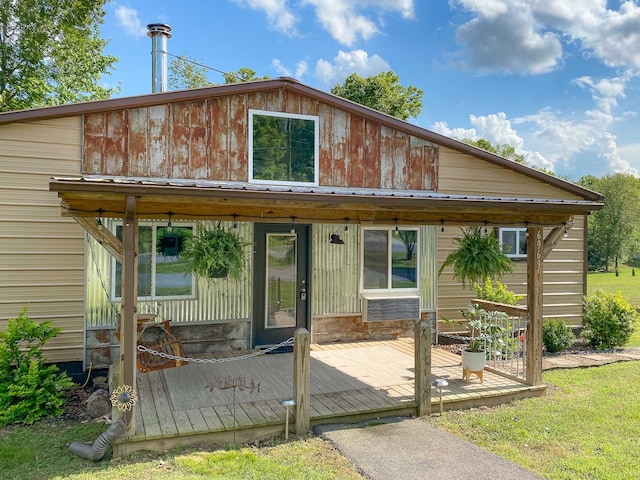 6969 Cuba Landing Rd, Waverly, TN 37185 - rear view of property featuring a wooden deck