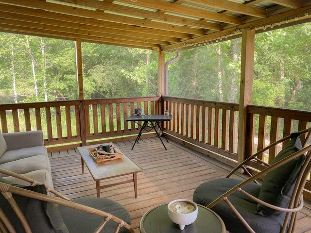 6969 Cuba Landing Rd, Waverly, TN 37185 - wooden terrace featuring a view of trees and an outdoor hangout area