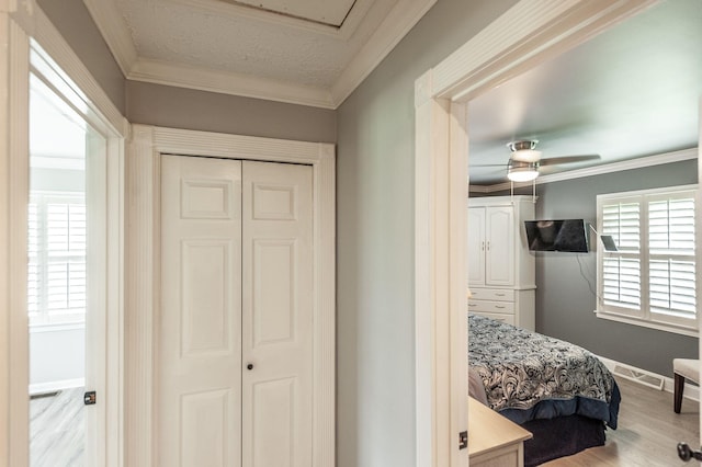 120 Brookhaven Dr, Gallatin, TN 37066 - bedroom featuring wood finished floors, ornamental molding, baseboards, a closet, and ceiling fan