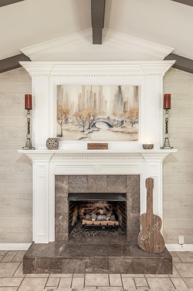 120 Brookhaven Dr, Gallatin, TN 37066 - detailed view of beamed ceiling, a fireplace, wooden walls, and baseboards