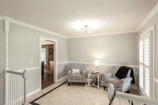 120 Brookhaven Dr, Gallatin, TN 37066 - sitting room featuring inlaid floor details, crown molding, baseboards, light tile patterned flooring, and a textured ceiling
