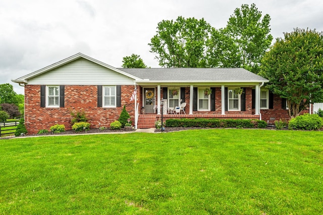 120 Brookhaven Dr, Gallatin, TN 37066 - single story home with brick siding, covered porch, and a front lawn