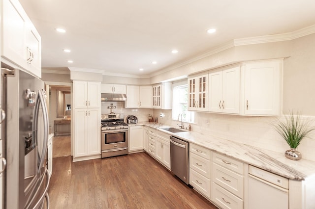 120 Brookhaven Dr, Gallatin, TN 37066 - kitchen featuring stainless steel appliances, a sink, under cabinet range hood, light stone countertops, and white cabinets