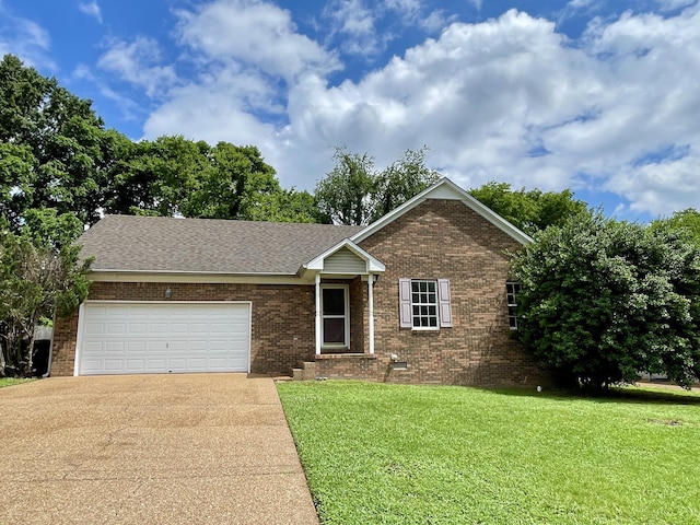 2956 Augusta Trace Dr, Spring Hill, TN 37174 - single story home featuring driveway, brick siding, a garage, a front yard, and roof with shingles