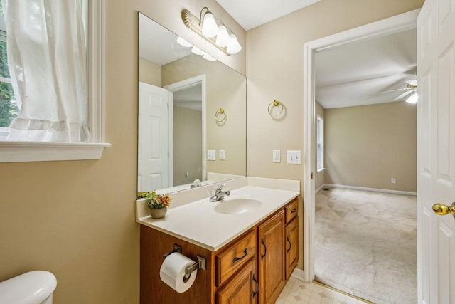 2956 Augusta Trace Dr, Spring Hill, TN 37174 - half bathroom featuring vanity, toilet, a ceiling fan, and baseboards