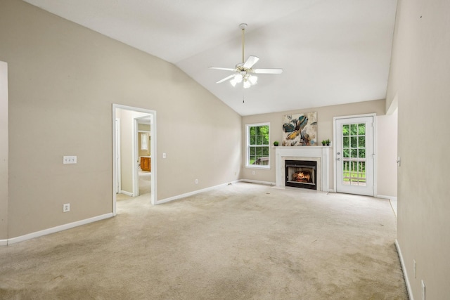2956 Augusta Trace Dr, Spring Hill, TN 37174 - unfurnished living room with ceiling fan, a fireplace with flush hearth, baseboards, carpet, and high vaulted ceiling