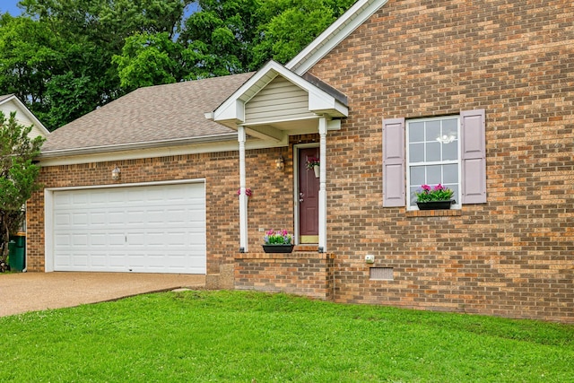 2956 Augusta Trace Dr, Spring Hill, TN 37174 - view of front facade featuring concrete driveway, a front lawn, brick siding, a garage, and roof with shingles