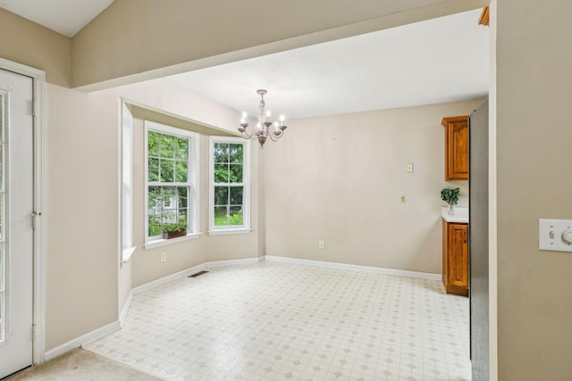 2956 Augusta Trace Dr, Spring Hill, TN 37174 - unfurnished dining area with a chandelier, light flooring, and baseboards