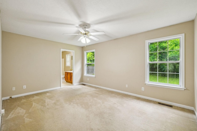 2956 Augusta Trace Dr, Spring Hill, TN 37174 - empty room with baseboards, ceiling fan, and light colored carpet