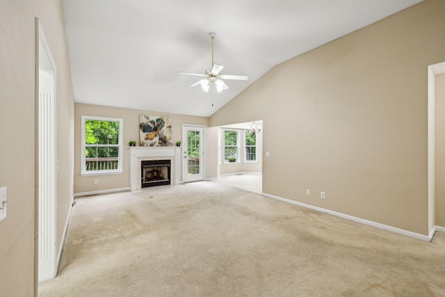 2956 Augusta Trace Dr, Spring Hill, TN 37174 - unfurnished living room featuring ceiling fan, a fireplace with flush hearth, carpet flooring, baseboards, and high vaulted ceiling