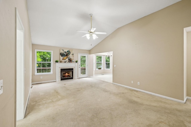 2956 Augusta Trace Dr, Spring Hill, TN 37174 - unfurnished living room with a ceiling fan, a fireplace with flush hearth, carpet floors, and high vaulted ceiling