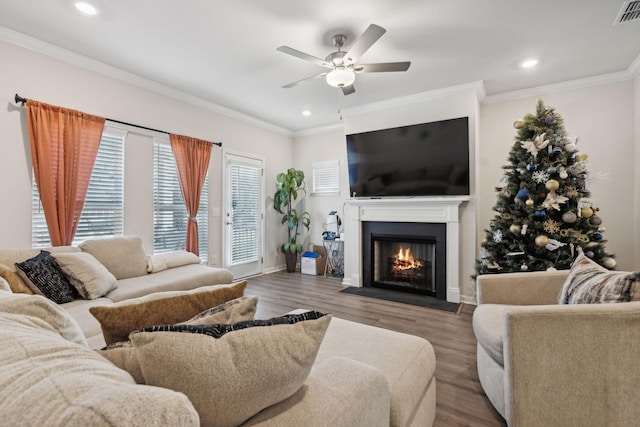 4537 Rockland Trl, Antioch, TN 37013 - living room with ceiling fan, recessed lighting, a fireplace with flush hearth, ornamental molding, and wood finished floors