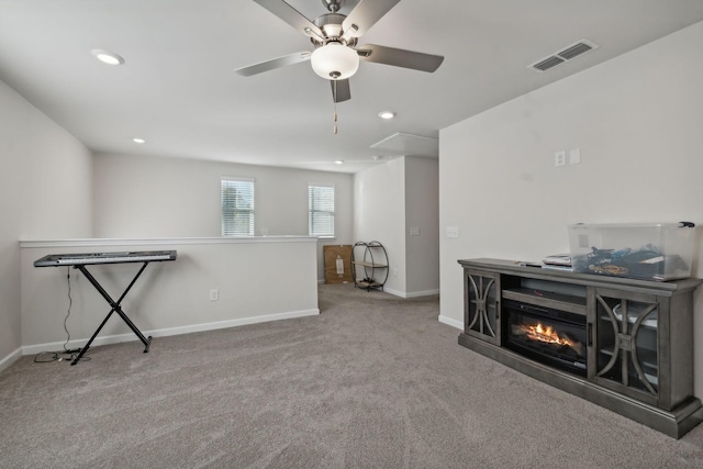 4537 Rockland Trl, Antioch, TN 37013 - interior space featuring baseboards, ceiling fan, recessed lighting, attic access, and a glass covered fireplace