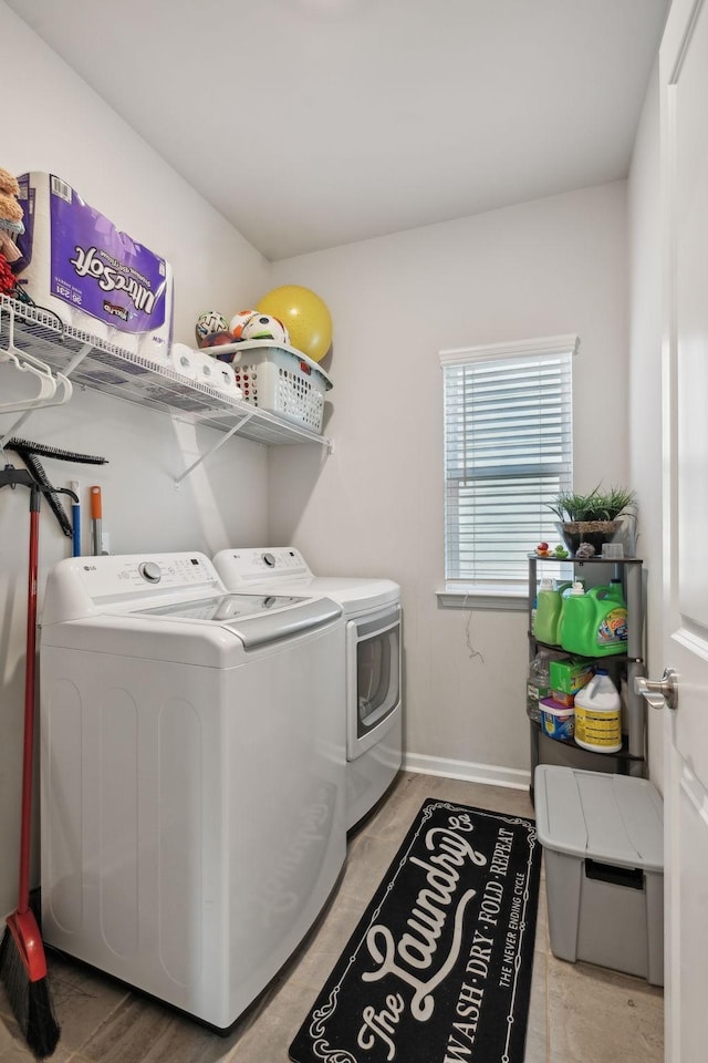 4537 Rockland Trl, Antioch, TN 37013 - laundry room featuring washing machine and dryer and baseboards