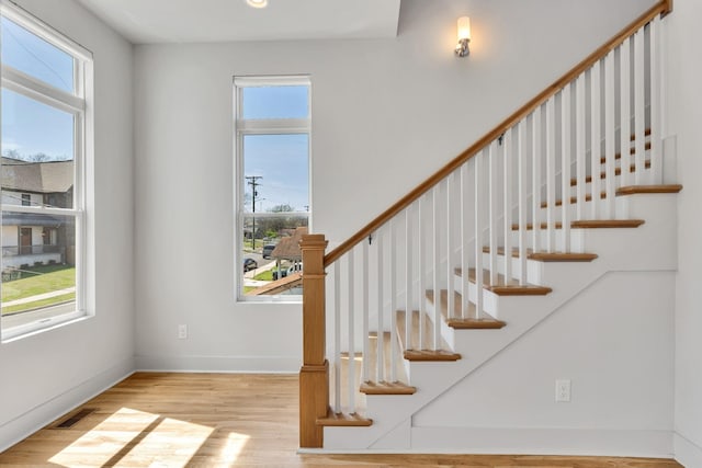 2514B Booker St, Nashville, TN 37208 - stairway with healthy amount of natural light, wood finished floors, baseboards, and recessed lighting