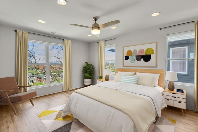 2514B Booker St, Nashville, TN 37208 - bedroom with light wood-style flooring, recessed lighting, and ceiling fan