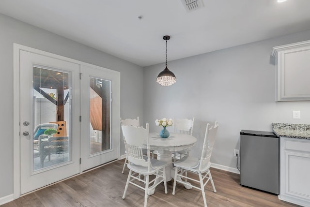 427 Tristan Way, Spring Hill, TN 37174 - dining room featuring wood finished floors and baseboards