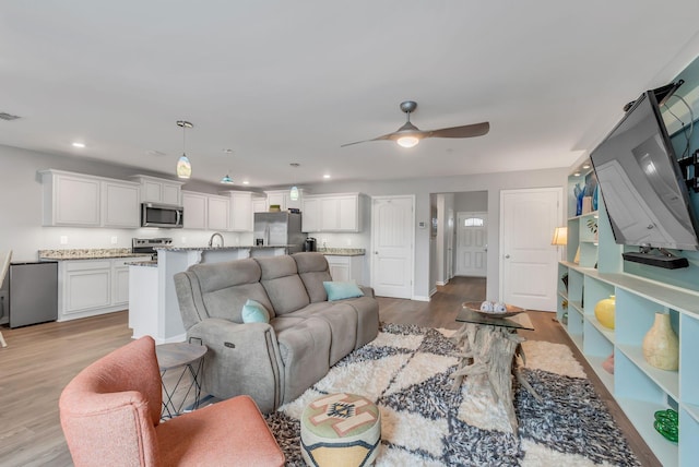 427 Tristan Way, Spring Hill, TN 37174 - living room featuring ceiling fan, light wood-style floors, and recessed lighting