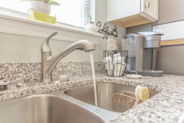 658 Old Chattanooga Pike SW, Cleveland, TN 37311 - kitchen view of a sink and white cabinets