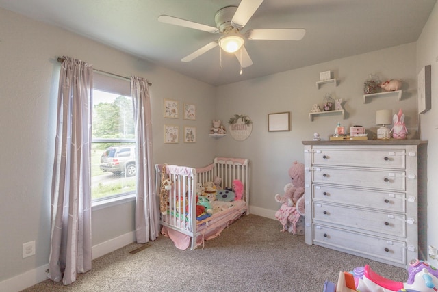658 Old Chattanooga Pike SW, Cleveland, TN 37311 - carpeted bedroom with a nursery area, baseboards, and a ceiling fan
