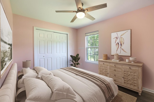 146 Sherron Dr, Dickson, TN 37055 - bedroom featuring a closet, dark wood-style flooring, ceiling fan, and baseboards