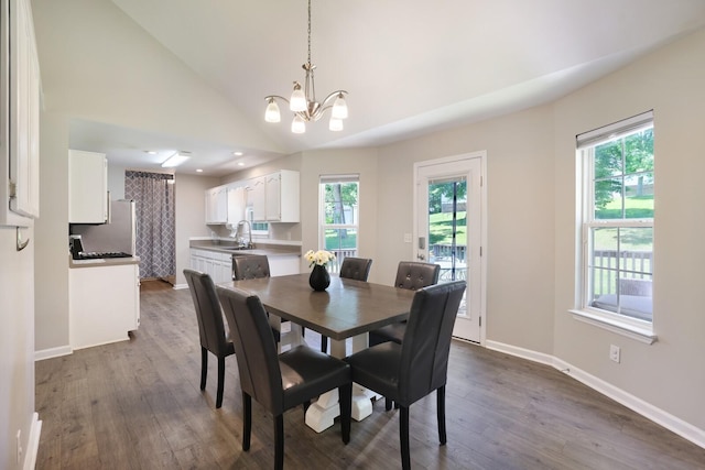 146 Sherron Dr, Dickson, TN 37055 - dining room featuring a chandelier, dark wood-style flooring, baseboards, vaulted ceiling, and recessed lighting