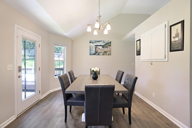 146 Sherron Dr, Dickson, TN 37055 - dining space featuring a chandelier, dark wood-type flooring, lofted ceiling, and baseboards