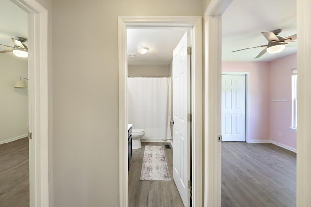 146 Sherron Dr, Dickson, TN 37055 - hallway with wood finished floors and baseboards