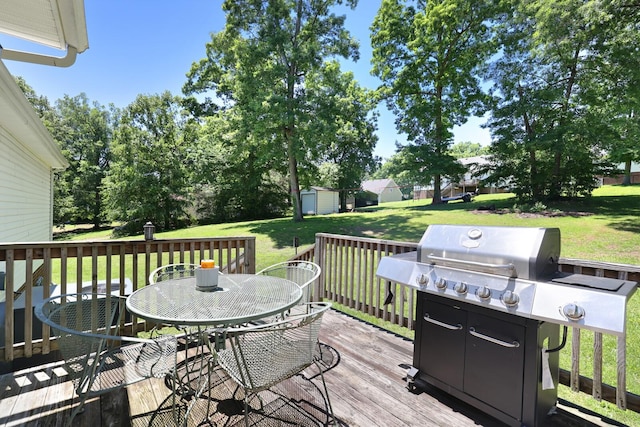 146 Sherron Dr, Dickson, TN 37055 - deck featuring outdoor dining space, a yard, and area for grilling