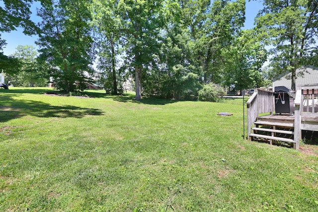 146 Sherron Dr, Dickson, TN 37055 - view of grassy yard featuring a wooden deck