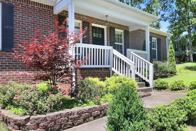 146 Sherron Dr, Dickson, TN 37055 - entrance to property featuring brick siding and a porch