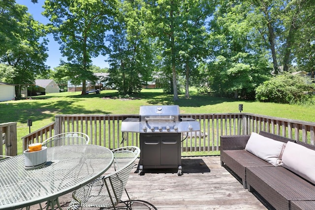 146 Sherron Dr, Dickson, TN 37055 - deck with an outdoor living space, a lawn, outdoor dining space, and area for grilling