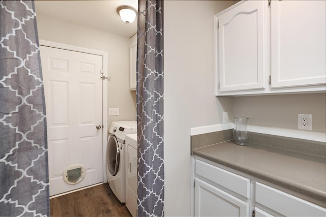 146 Sherron Dr, Dickson, TN 37055 - laundry room featuring washer and dryer, dark wood-style floors, and cabinet space
