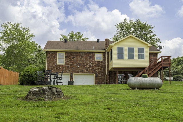 535 Dawson Rd, Cumberland Furnace, TN 37051 - back of house with brick siding, stairs, an attached garage, and a deck