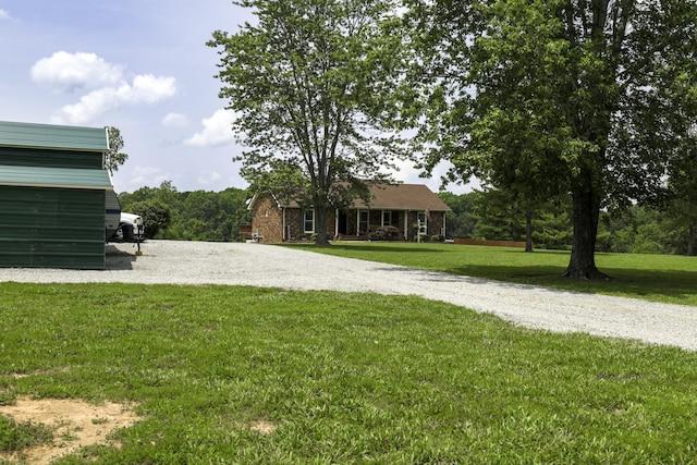535 Dawson Rd, Cumberland Furnace, TN 37051 - view of green lawn featuring driveway