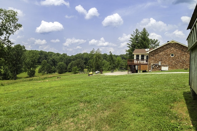535 Dawson Rd, Cumberland Furnace, TN 37051 - view of green lawn featuring a deck and stairs