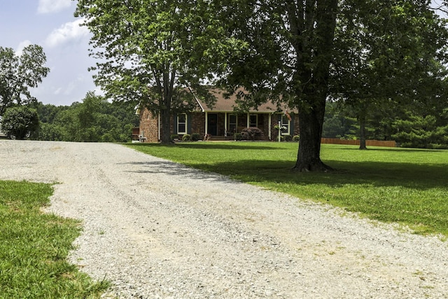 535 Dawson Rd, Cumberland Furnace, TN 37051 - view of front of home featuring driveway and a front yard
