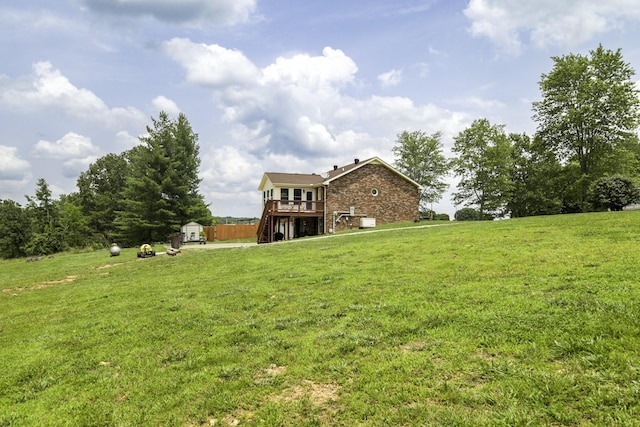 535 Dawson Rd, Cumberland Furnace, TN 37051 - view of green lawn with a deck, stairway, and a storage shed