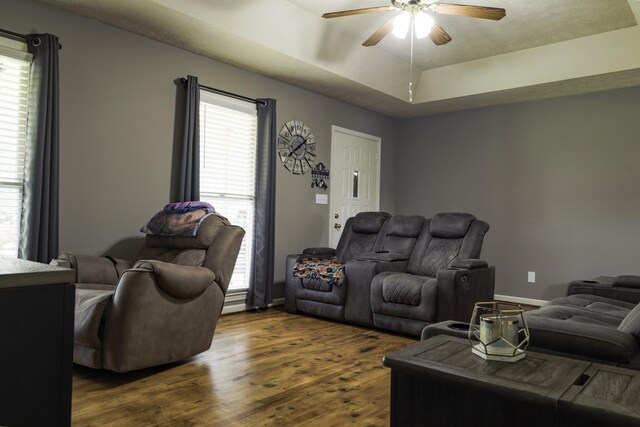 535 Dawson Rd, Cumberland Furnace, TN 37051 - living room featuring ceiling fan, dark wood-type flooring, and a tray ceiling