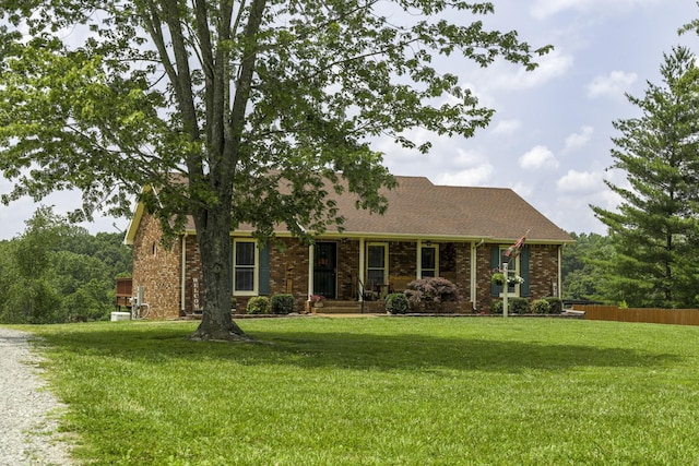 535 Dawson Rd, Cumberland Furnace, TN 37051 - view of front of home with brick siding and covered porch