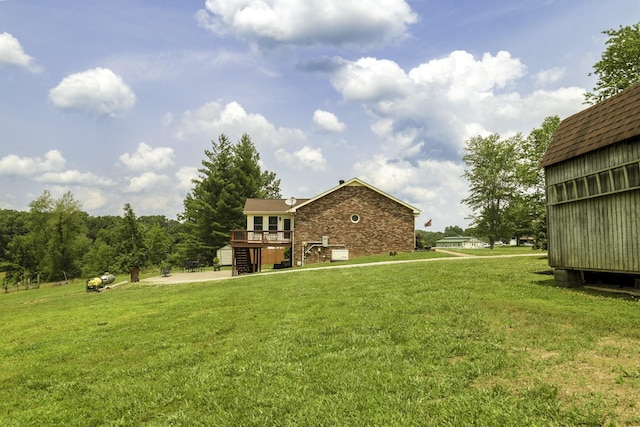 535 Dawson Rd, Cumberland Furnace, TN 37051 - view of grassy yard featuring a deck and stairs
