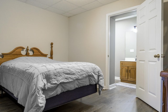 535 Dawson Rd, Cumberland Furnace, TN 37051 - bedroom featuring dark wood finished floors and a paneled ceiling