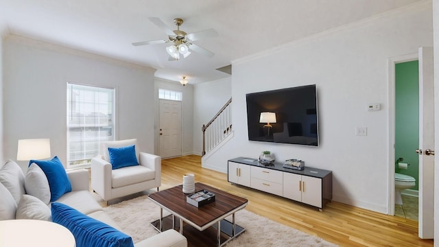 2271 Dewey Dr Unit G2, Spring Hill, TN 37174 - living area featuring light wood-style flooring, stairway, ornamental molding, ceiling fan, and baseboards