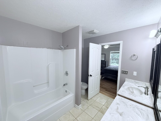 309 Caydras Way, Lafayette, TN 37083 - bathroom with toilet, ensuite bath, shower / washtub combination, vanity, and a textured ceiling