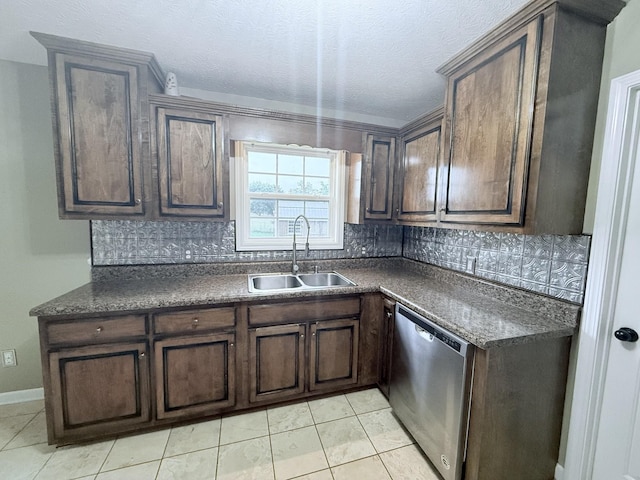 309 Caydras Way, Lafayette, TN 37083 - kitchen with dishwasher, a sink, dark countertops, decorative backsplash, and a textured ceiling