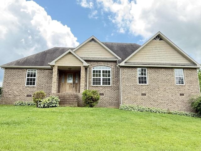 309 Caydras Way, Lafayette, TN 37083 - view of front of house with crawl space, brick siding, a front yard, and a shingled roof