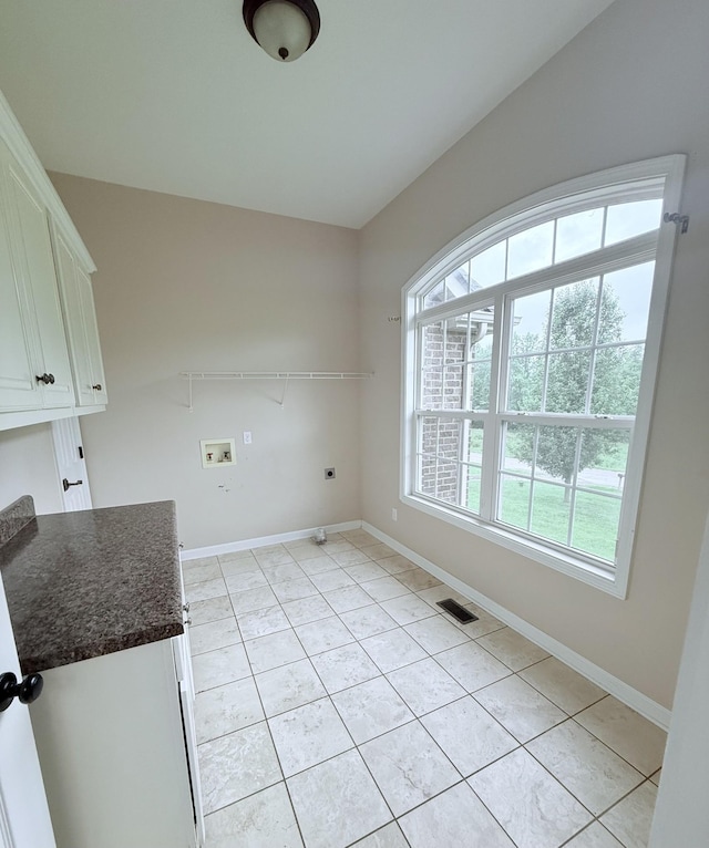 309 Caydras Way, Lafayette, TN 37083 - unfurnished dining area with baseboards and light tile patterned floors
