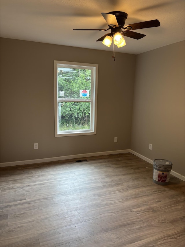 615 6th Ave N, Lewisburg, TN 37091 - spare room with ceiling fan, wood finished floors, and baseboards