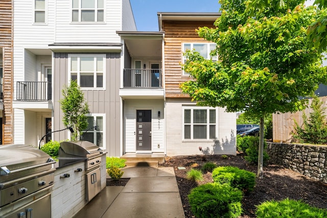 507 Vernon Cir, Nashville, TN 37209 - view of property with area for grilling and board and batten siding