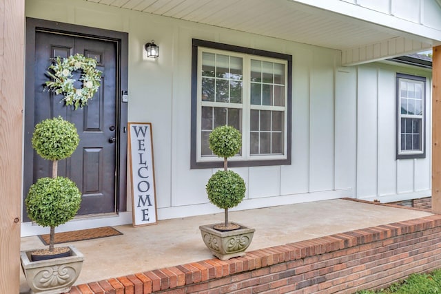 2312 Forrest Fields Dr, Chapel Hill, TN 37034 - view of exterior entry with board and batten siding and covered porch